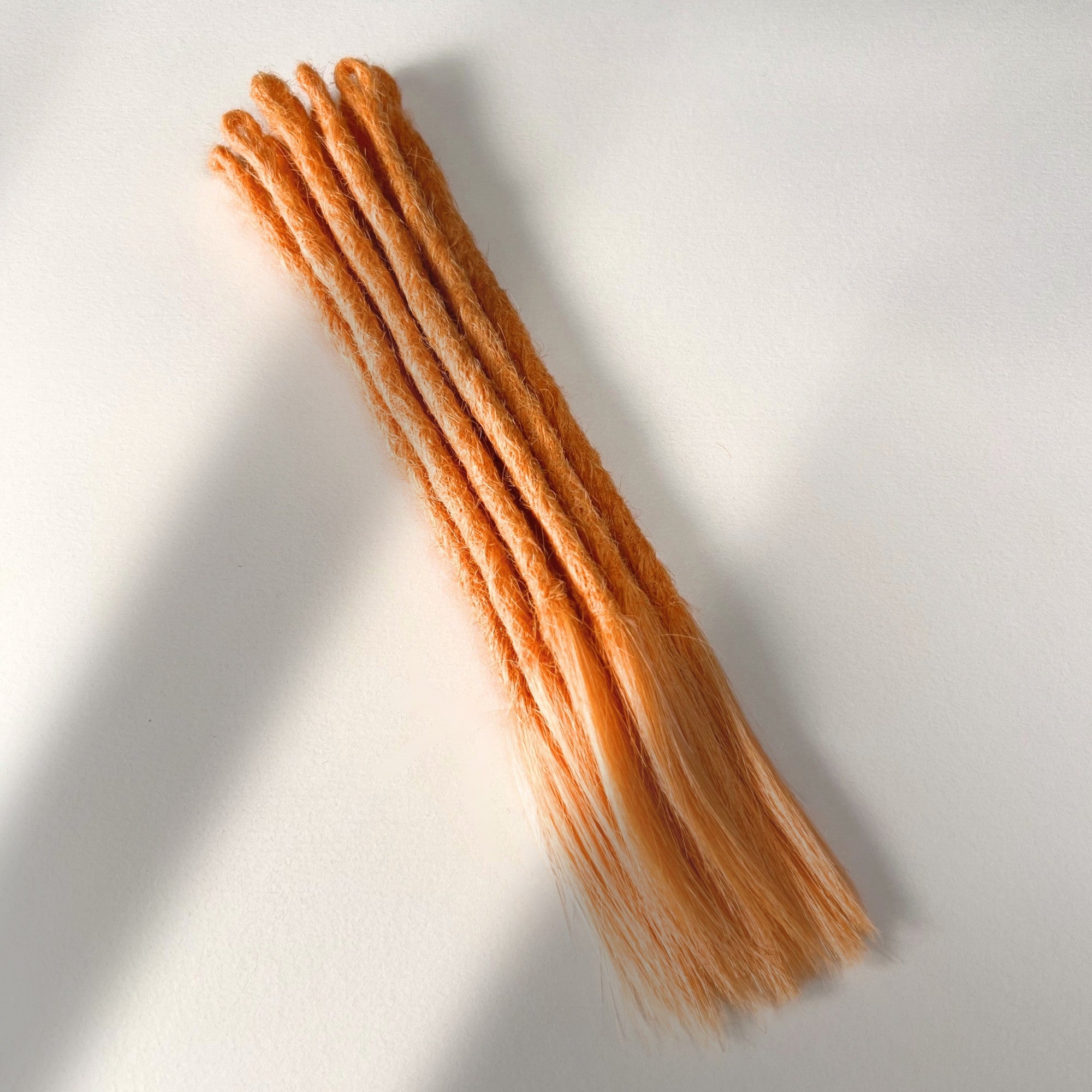 Straight Locs | Peach Fuzz