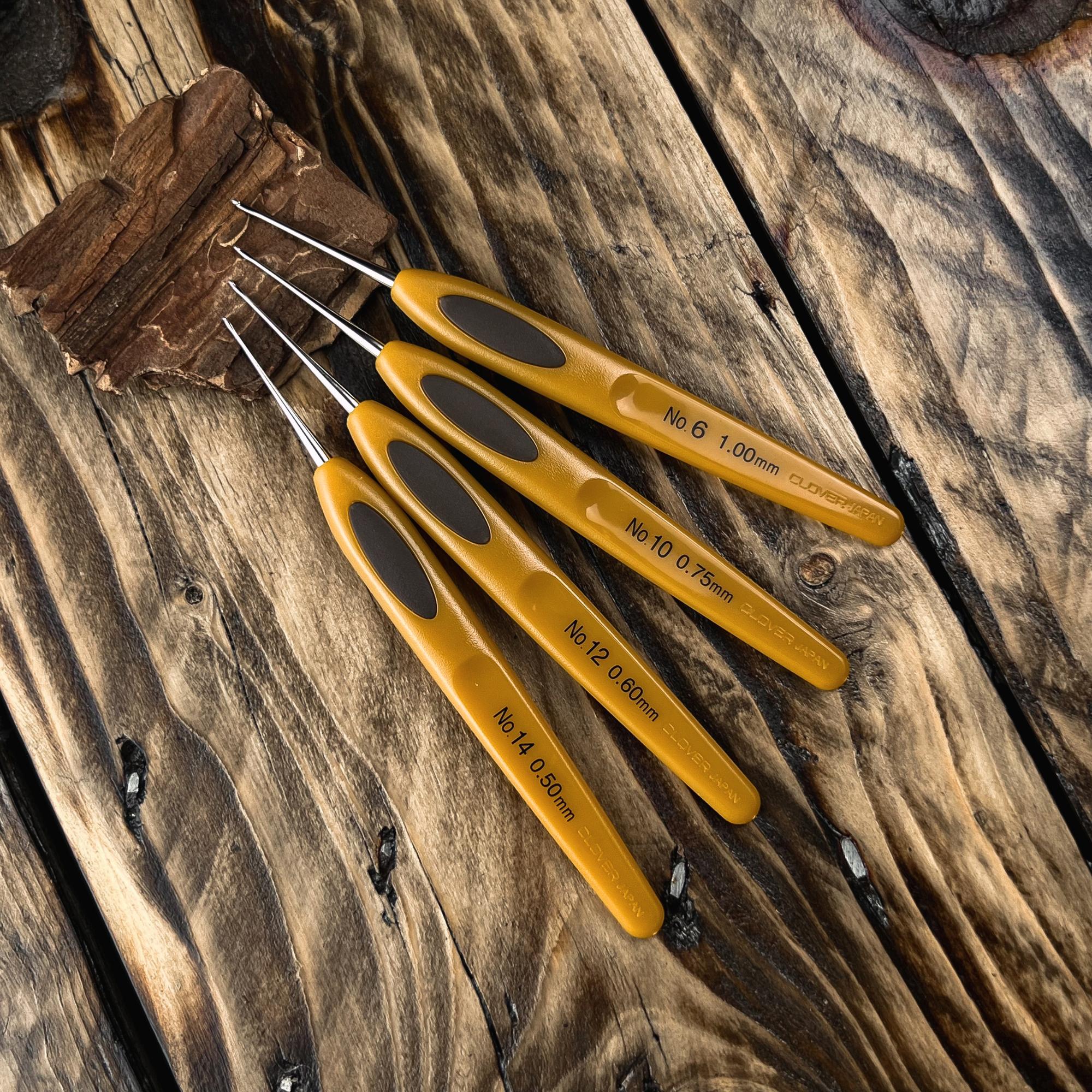Set of four Clover Micro Crochet Hooks in 1.00 mm, 0.75 mm, 0.60 mm and 0.50 mm for professional Loc and Dreadlock maintenance.