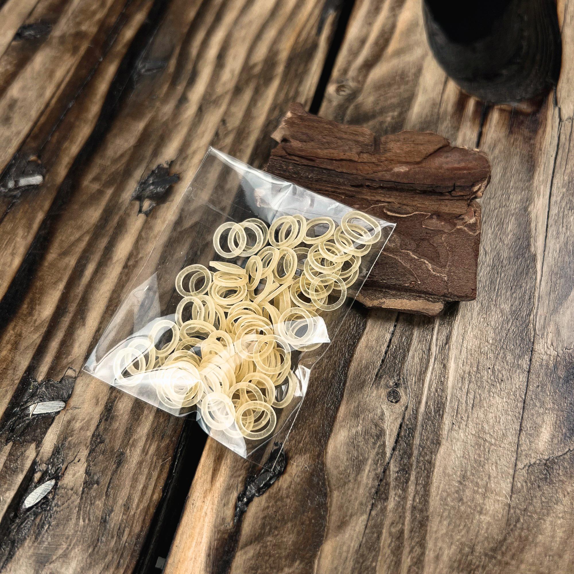 Pack of natural rubber bands for securing Human Hair Loc Extensions and Synthetic Locs during temporary installations.