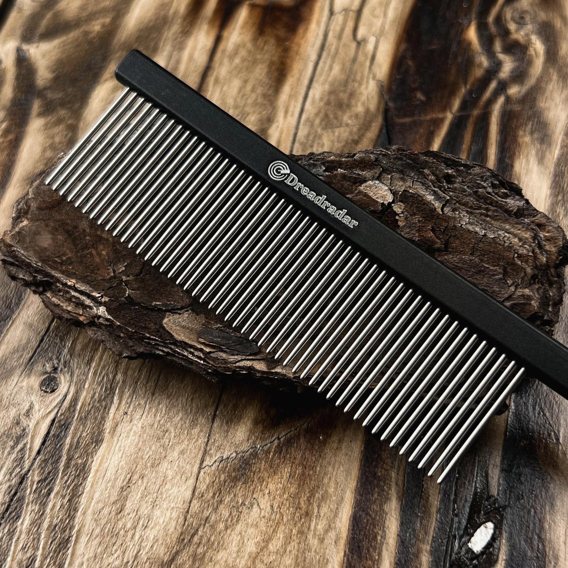 Close-up of the Dreadradar Professional Pin Tail Comb featuring fine stainless steel teeth for precise hair sectioning.