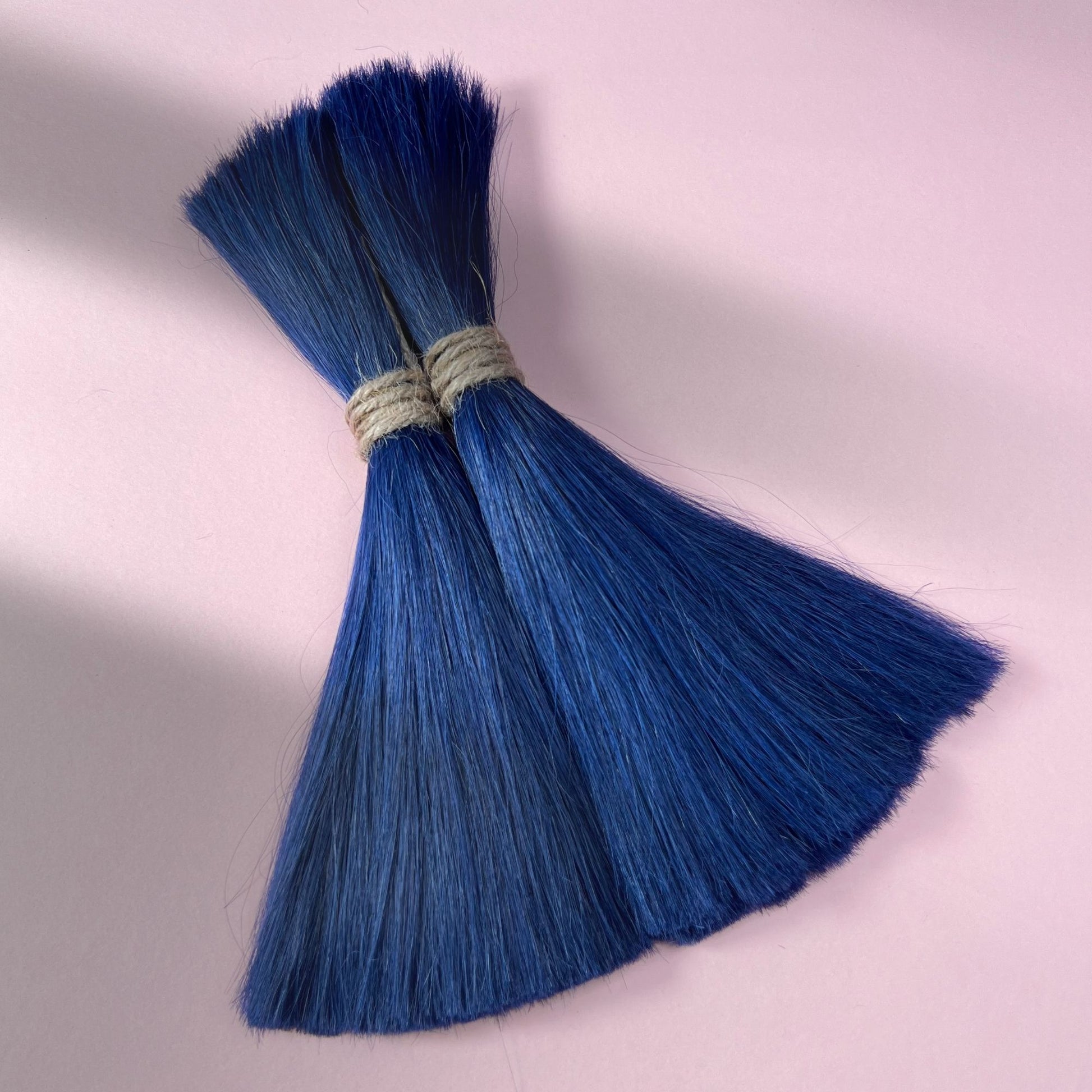 Full view of straight human hair in Midnight Blue.