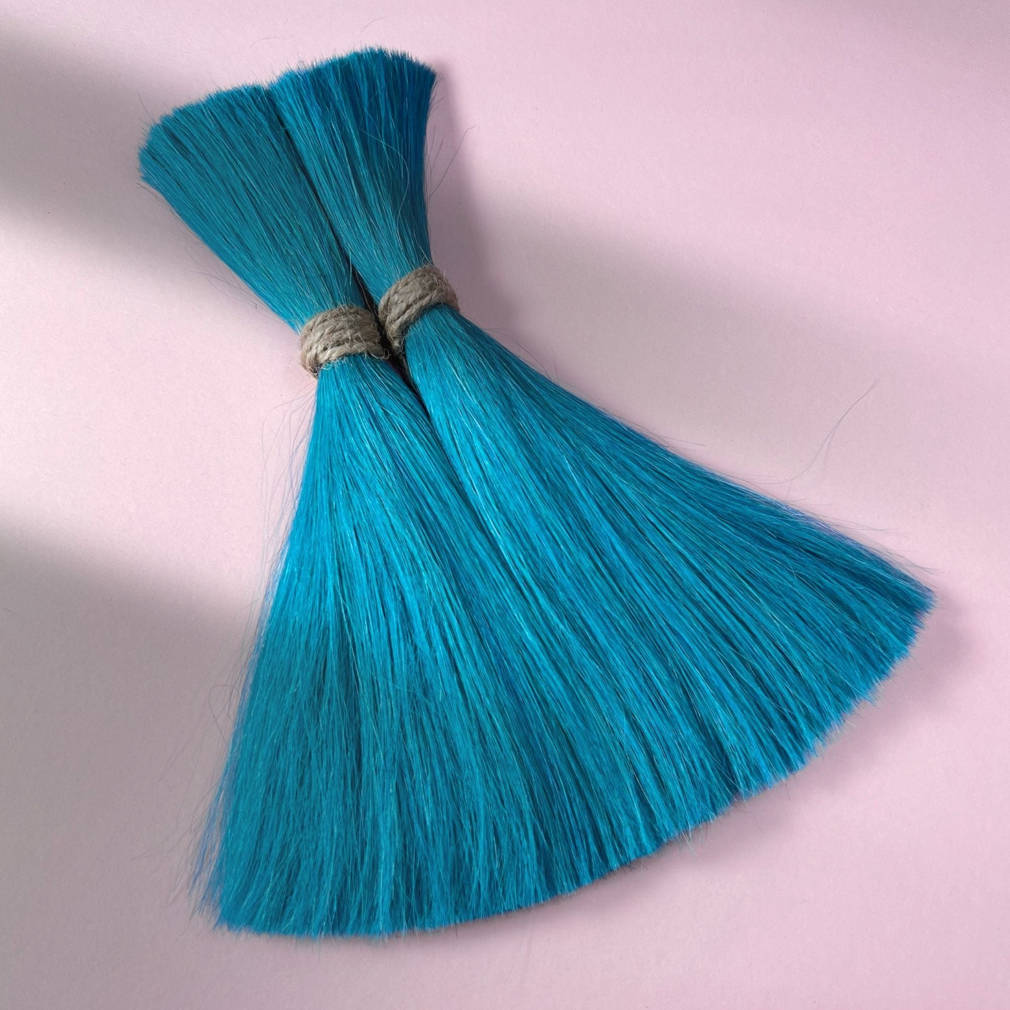 Full view of straight human hair in Frost Blue.