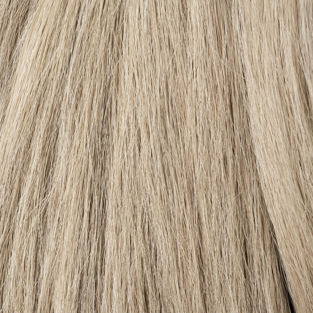 Close-up of Place In The Sun loose human hair texture for Straight Loc Extensions