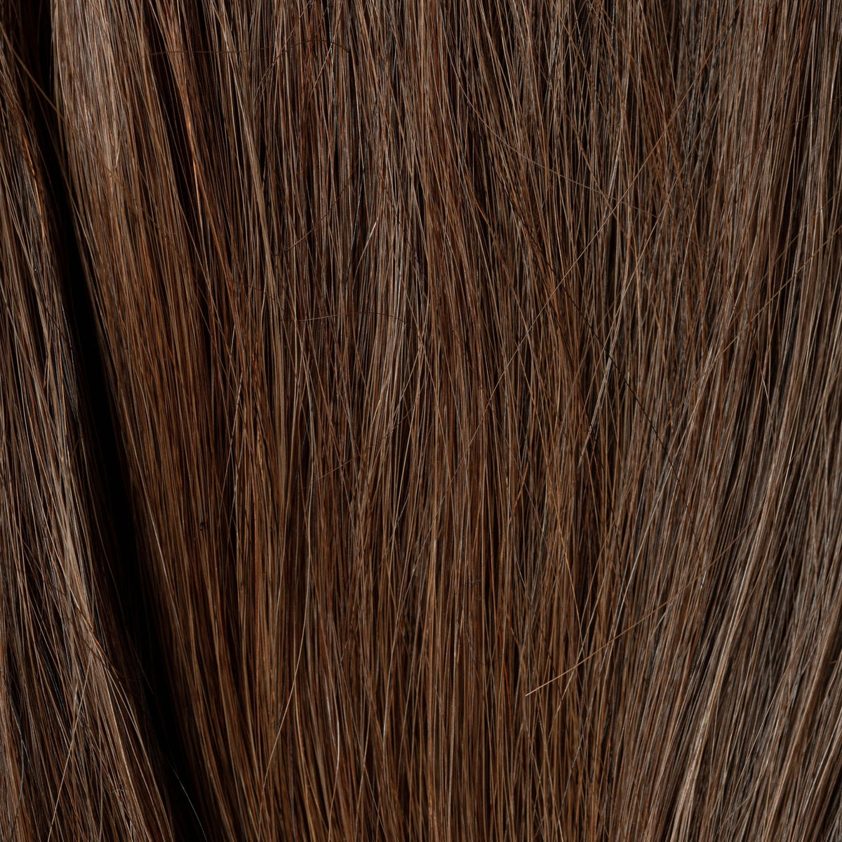 Close-up of Spicy Cinnamon loose human hair texture for Straight Loc Extensions