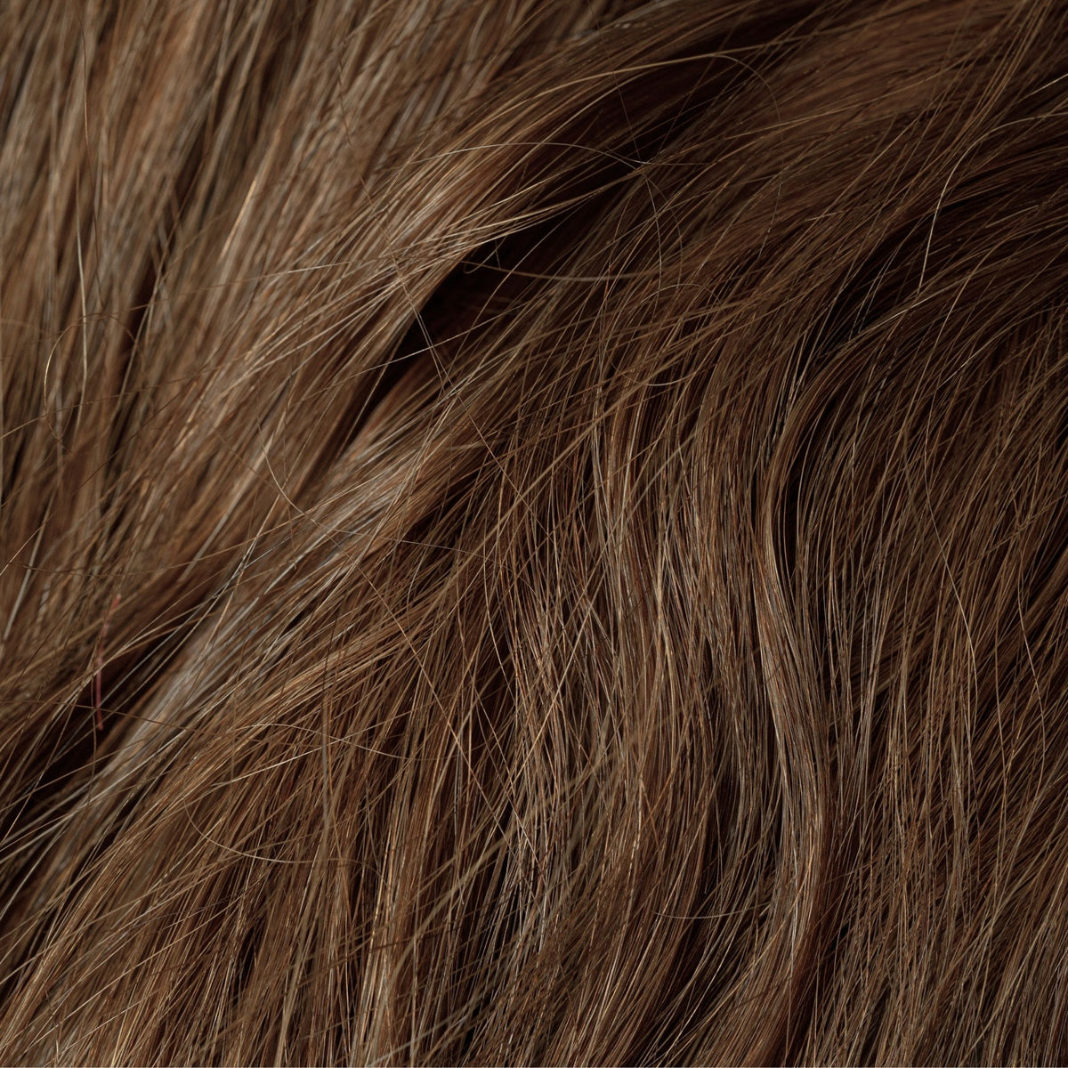 Close-up of Tiger Oak loose human hair texture for Straight Loc Extensions