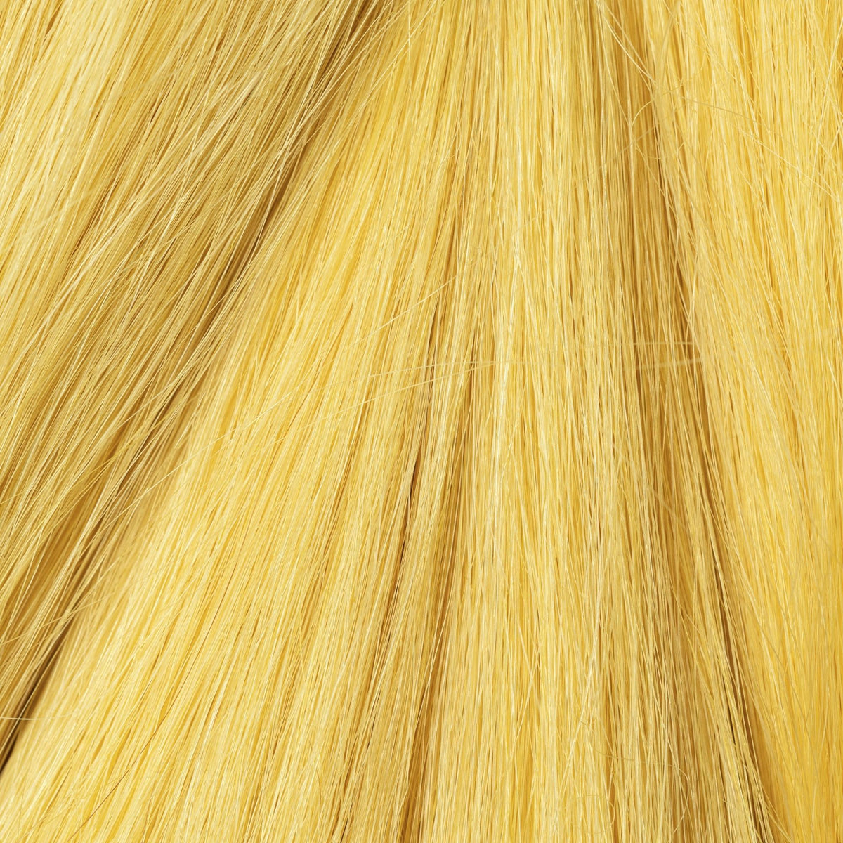 Close-up of Yellow Ochre loose human hair texture for Straight Loc Extensions