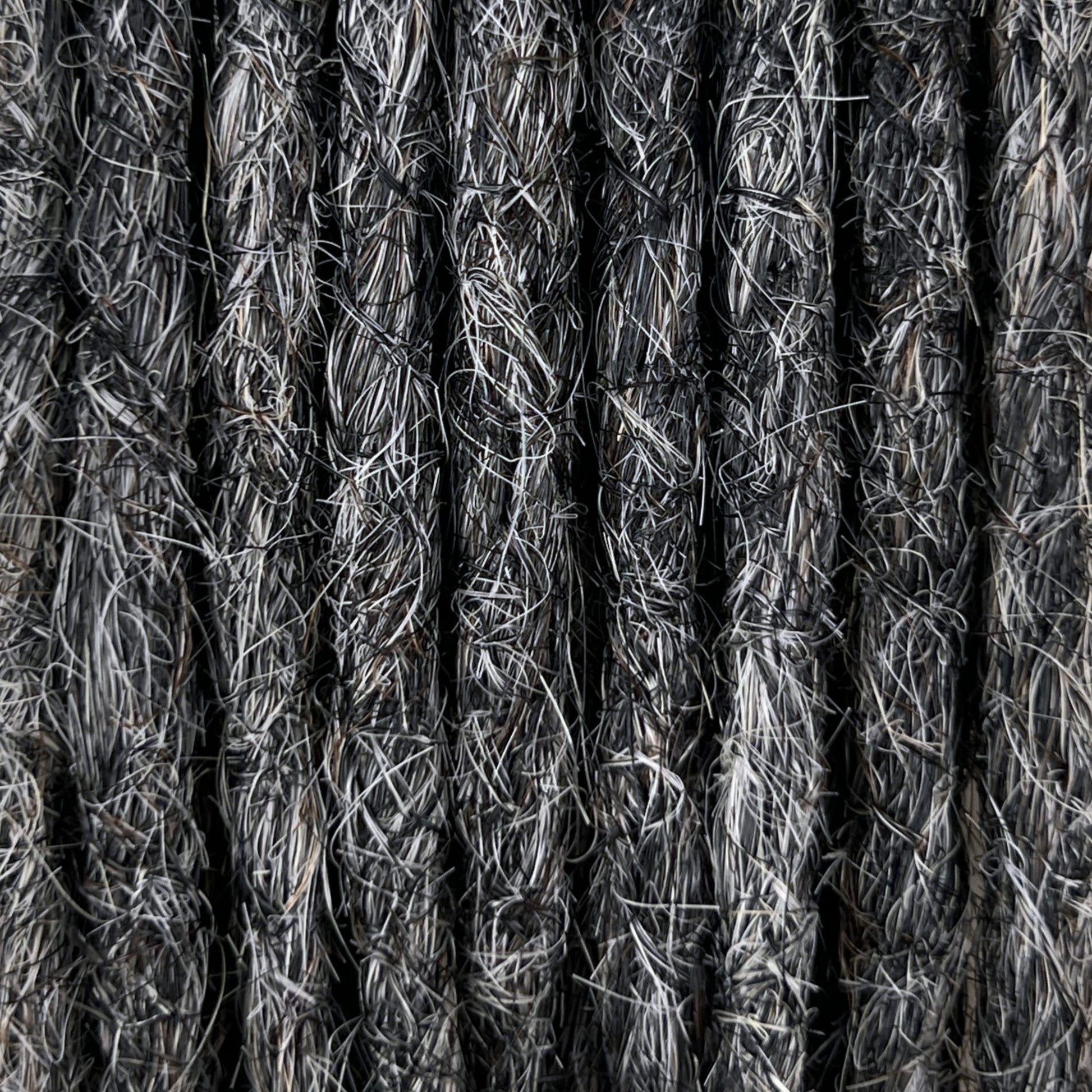 Close-up of straight loc extensions in Steel Silver, showing the texture and color.